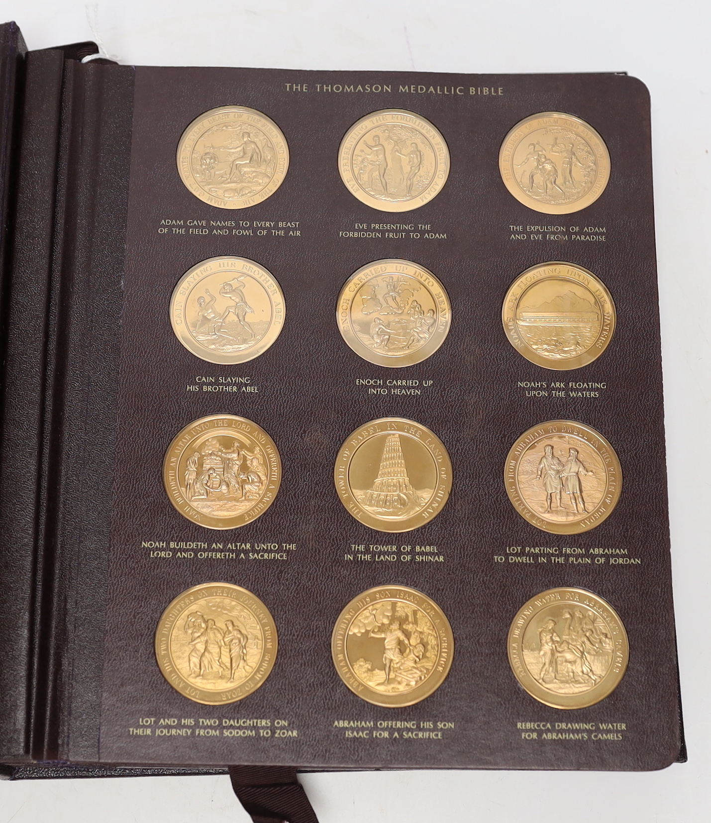 The Thomason Medallic Bible, Franklin mint version, sixty medals in a folder